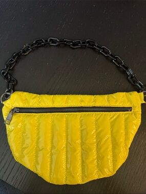 ah.dorned bright yellow Reese Liquid Quilted Nylon Bum Bag. Black chain strap.